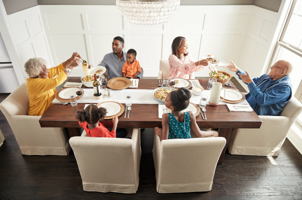 Family having breakfast at the dining table | Fredericks Floor covering